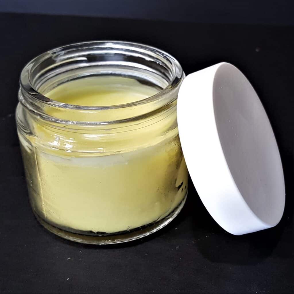 Use old jars to store your homemade paw balm.