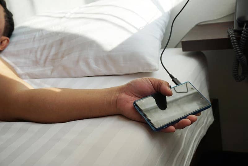 Cellphone plugged in and not being used and wasting energy