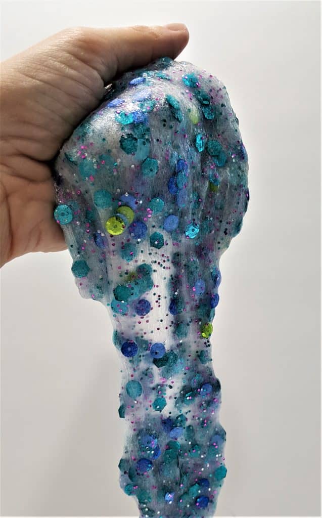 Mermaid Slime - Slimmer & Shine Slime | Mermaid Slime is the ultimate glitter slime! It has a wonderfully unique and fun texture. Using a clear slime base makes this an easy and fun kids craft!