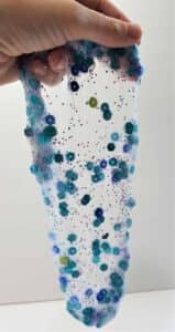 Mermaid Slime - Slimmer & Shine Slime | Mermaid Slime is the ultimate glitter slime! It has a wonderfully unique and fun texture. Using a clear slime base makes this an easy and fun kids craft!